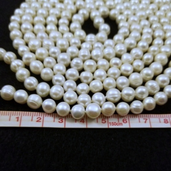 REAL 65" White Pearl Strand - Picture 6 of 6